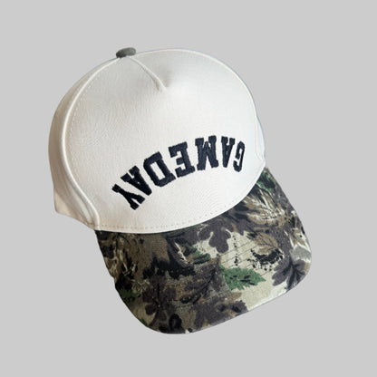 cream baseball hat with 'GAMEDAY' text and camouflage brim - embroidered hat 
