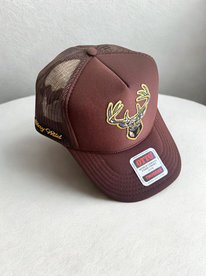 Camo deer head brown trucker patch hat with stay wild side patch