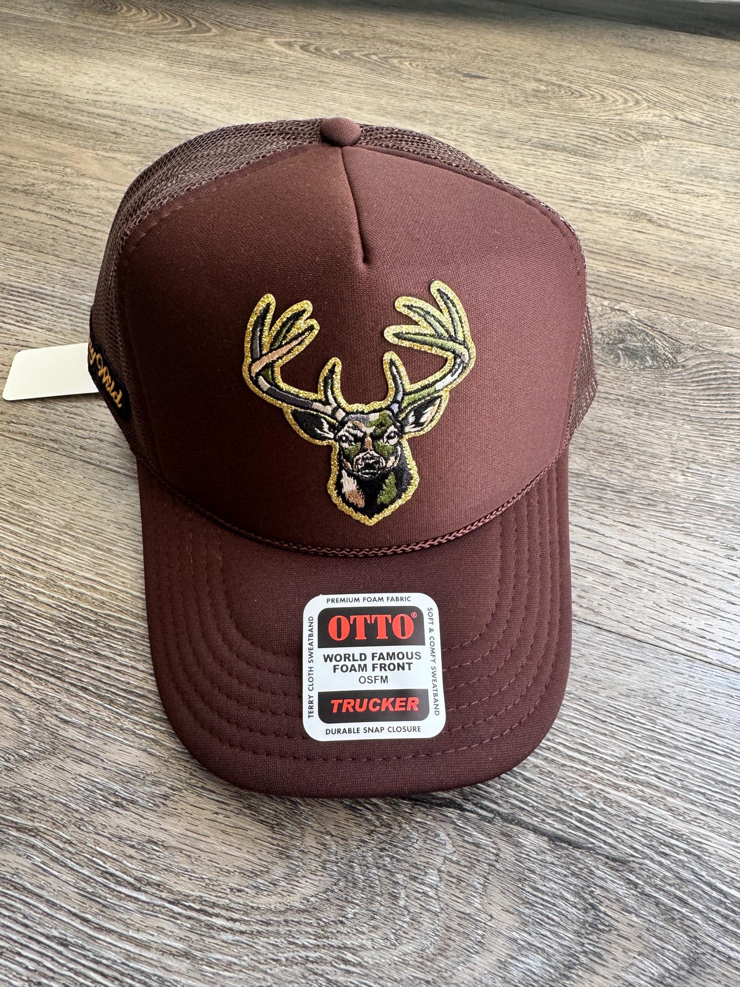 Camo deer head brown trucker patch hat with stay wild side patch
