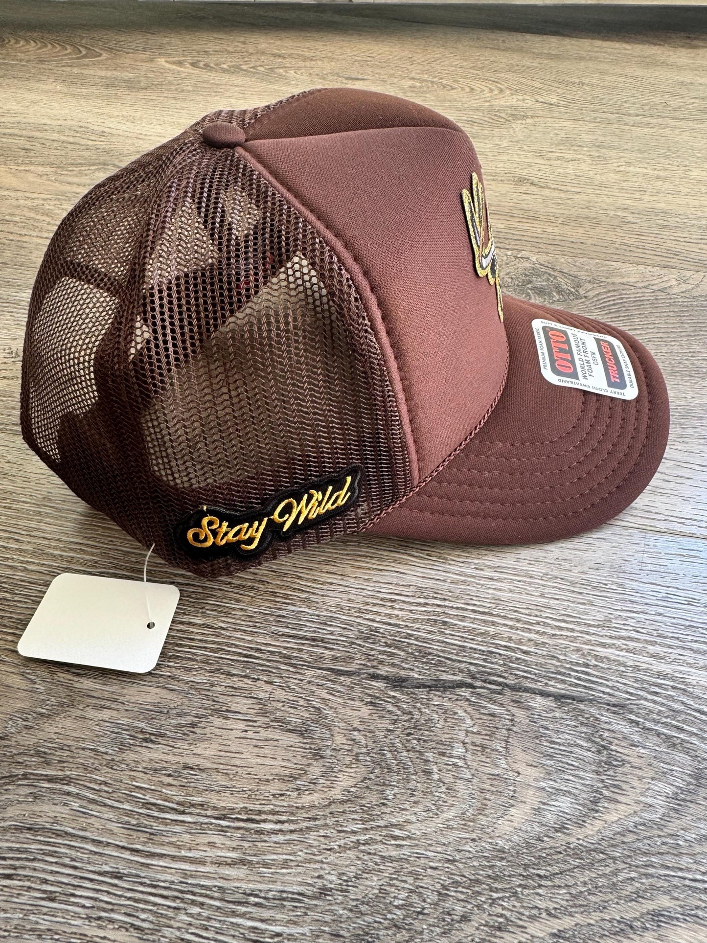 Camo deer head brown trucker patch hat with stay wild side patch