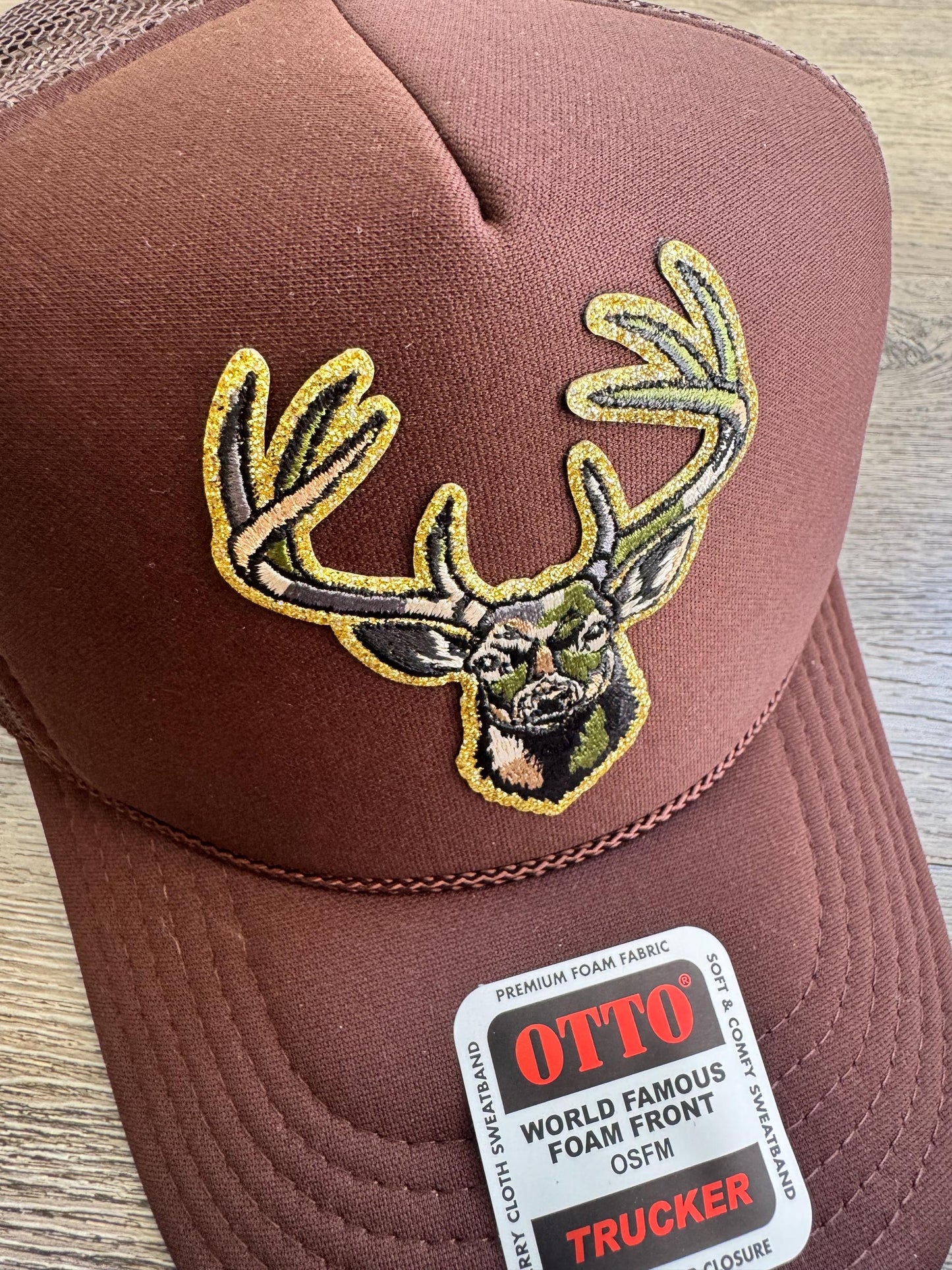 Camo deer head brown trucker patch hat with stay wild side patch